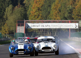 Classic cars race along the Kemmel Straight at the Spa-Francorchamps circuit