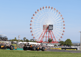 McLaren drivers racing at Suzuka during 2023 Japanese Grand Prix